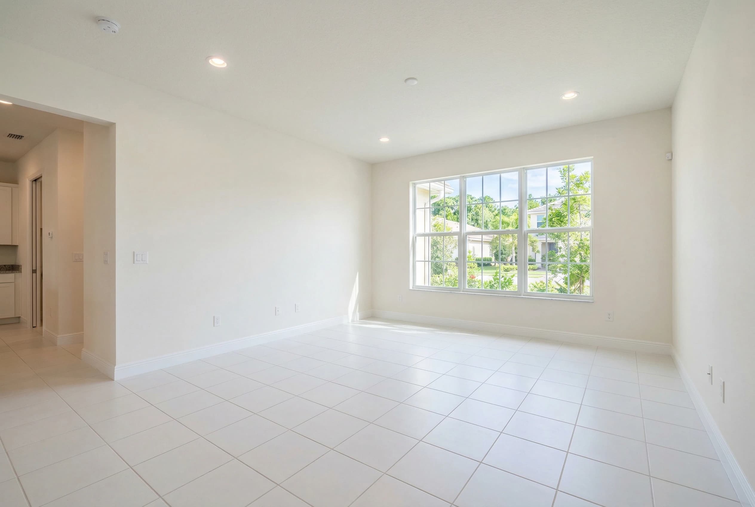 Virtually staged standard living room by Desiome - before