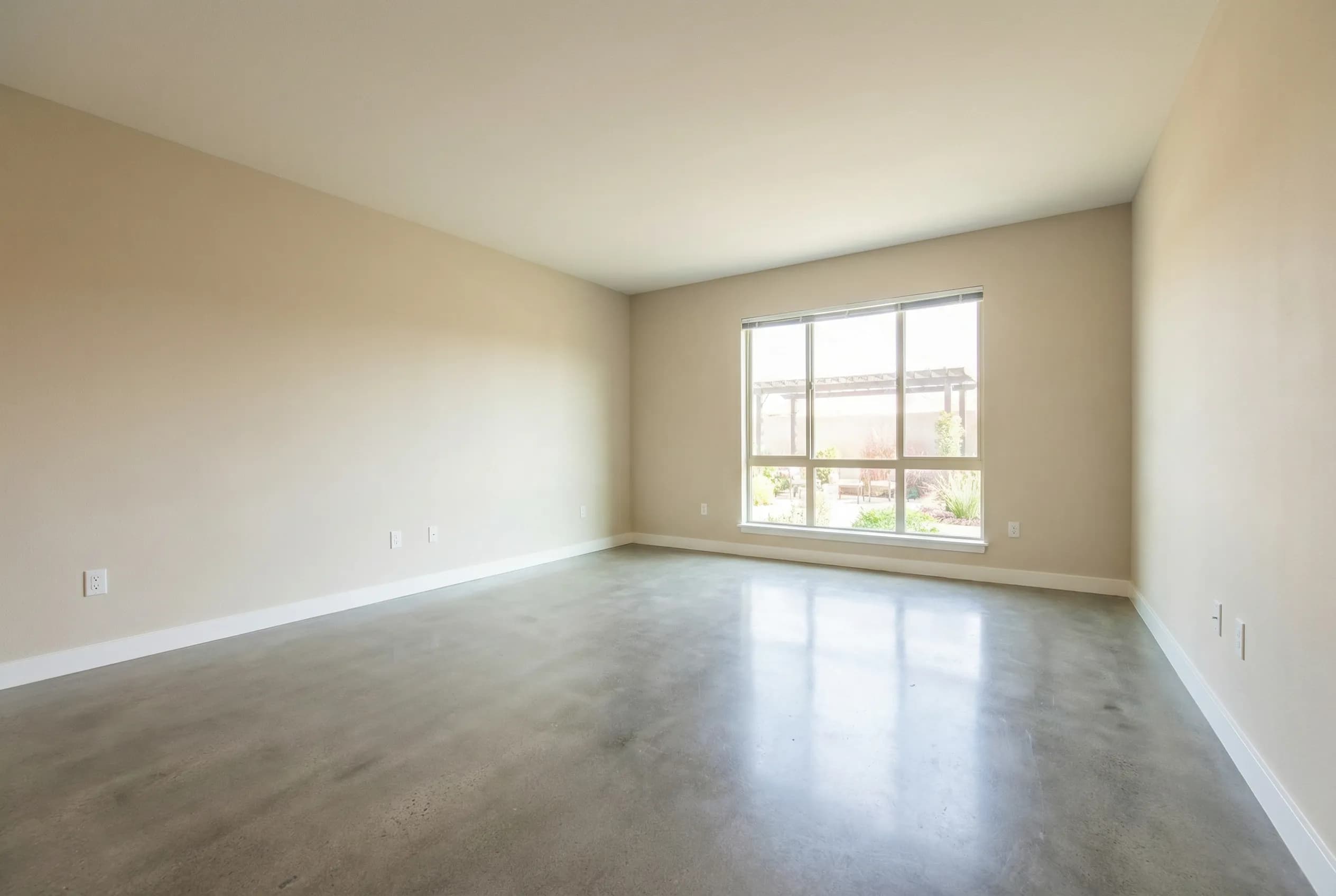 Virtually staged standard living room by Desiome - before